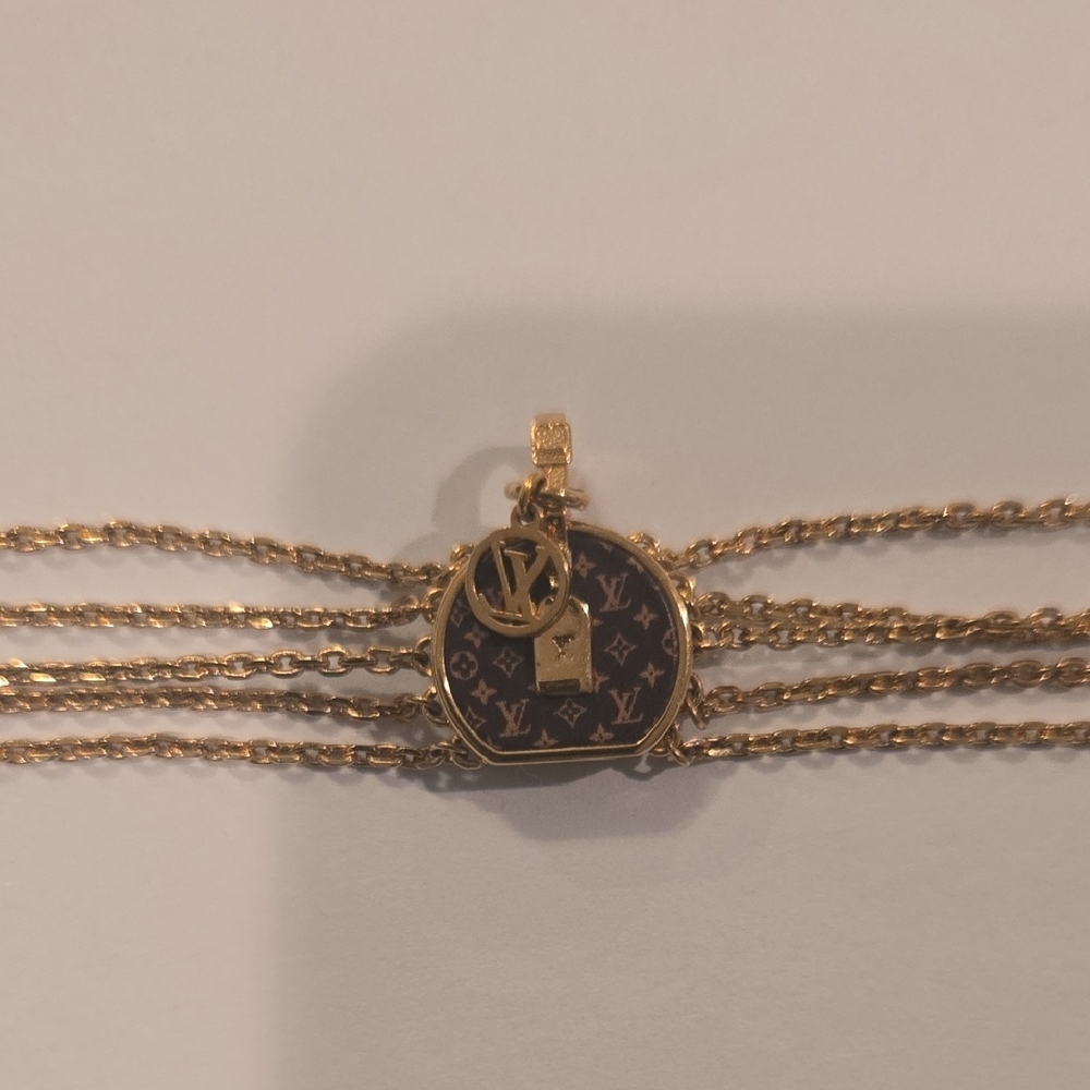 Louis Vuitton bracelet with Monogram Pendant